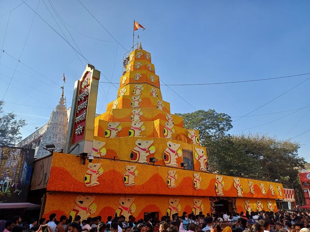 Dagdusheth Halwai Ganpati temple covered in marigold decoration